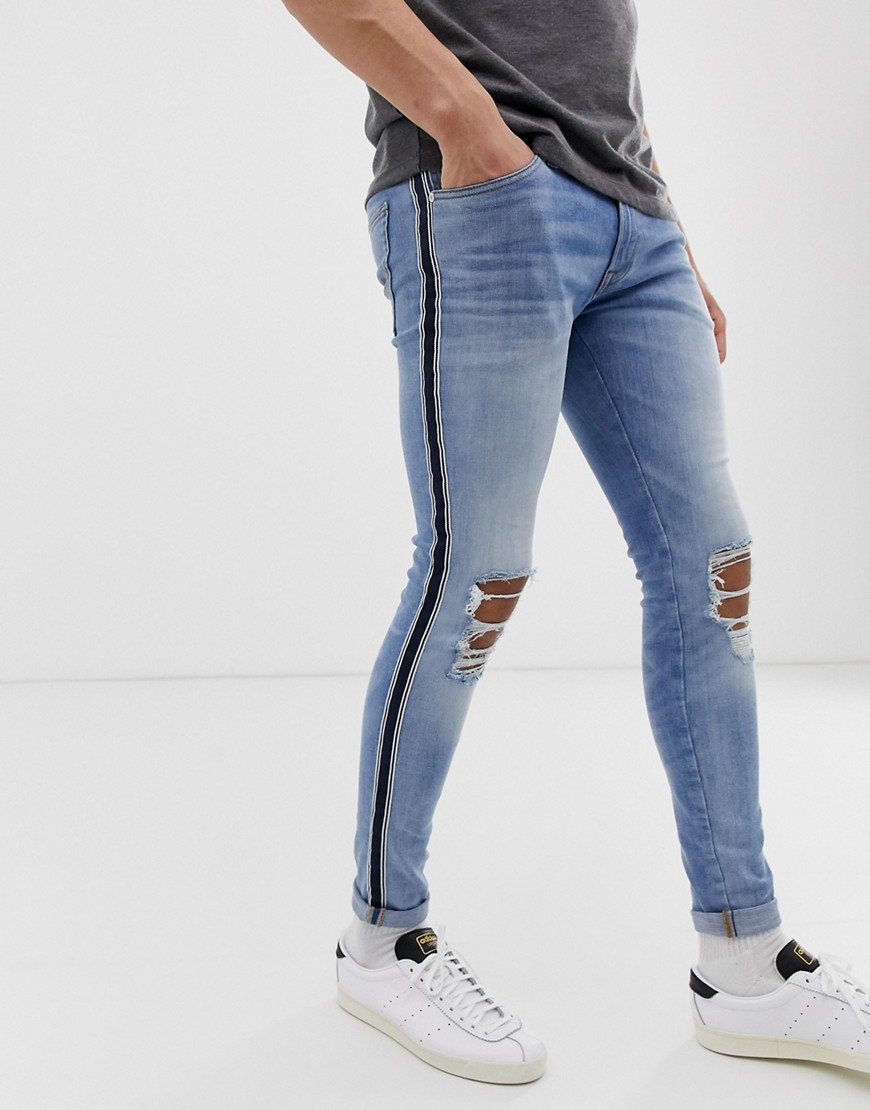 Jack & Jones Intelligence – Spray On – Blå skinny jeans med revor på knäna och revärer
