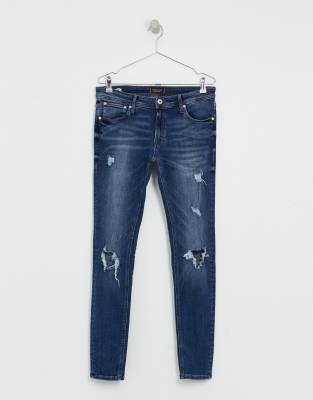 blue spray on skinny jeans