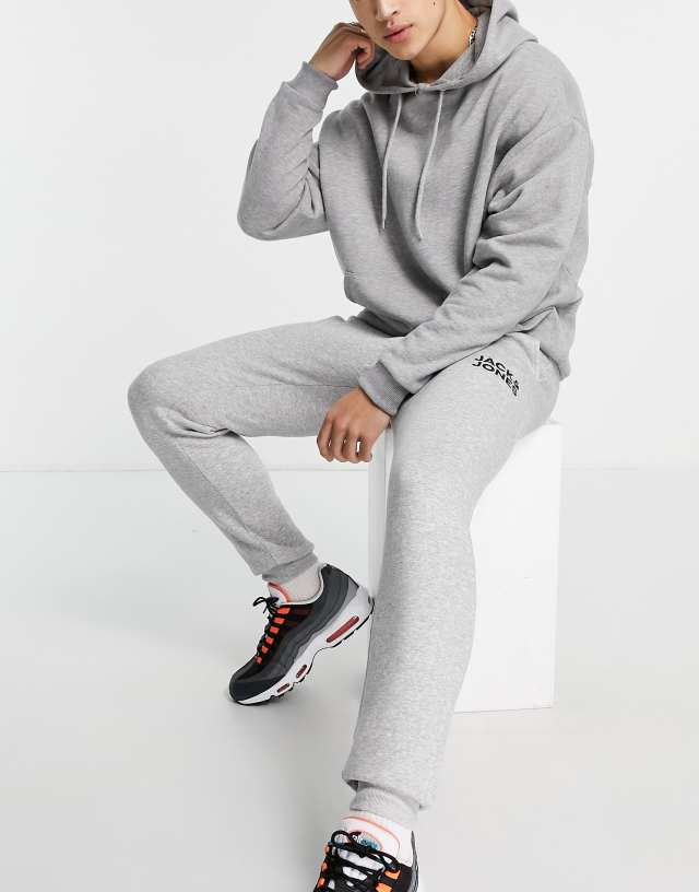 Jack & Jones Intelligence sweatpants in slim fit with logo in light gray