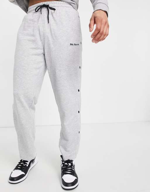 Jack Jones Intelligence sweatpants with snaps side in gray