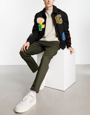 Jack & Jones Jack & Jones Intelligence tapered carrot fit smart cargo with zip detail in khaki-Green