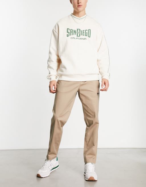 Jack & Jones Intelligence tapered carrot fit smart cargos with zip detail in beige 