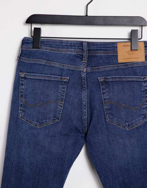 Jack Jones Intelligence Tom spray on jeans in mid blue ASOS