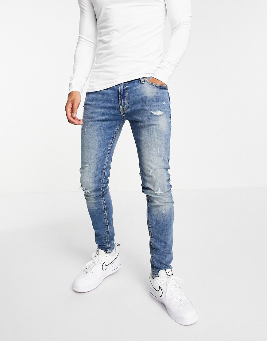 Jack & Jones Intelligence - Tom - Superskinny jeans in midwash blauw