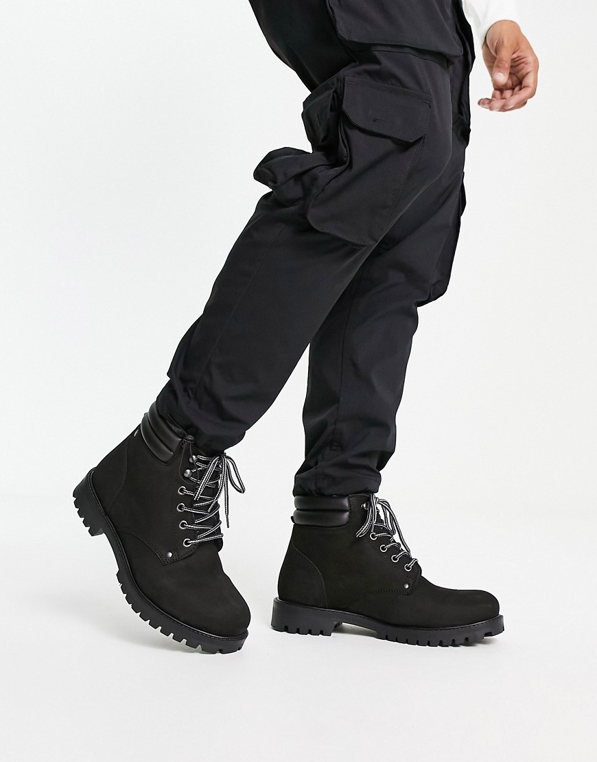lace-up trucker boots in black