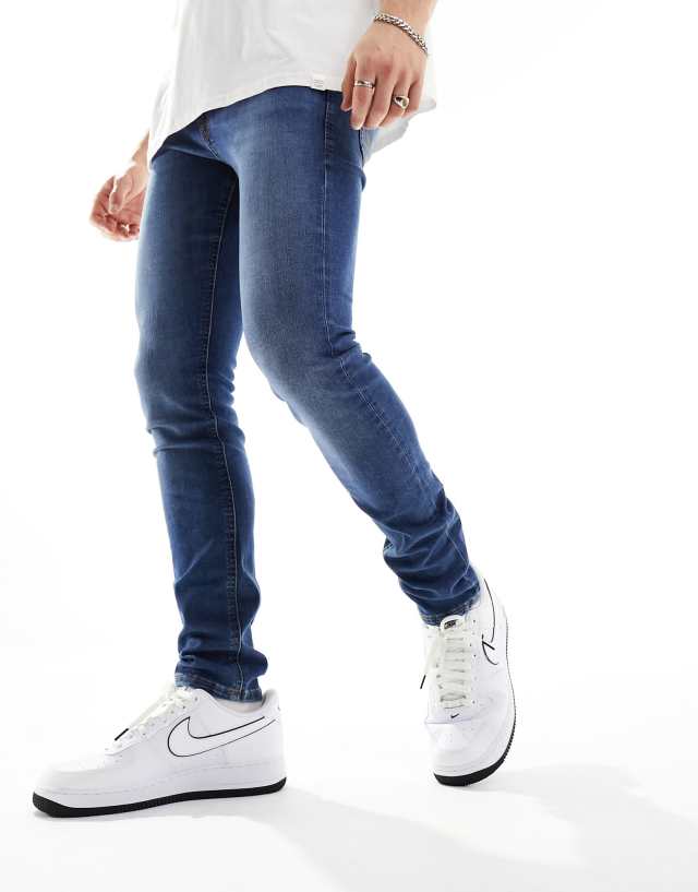 Jack & Jones - liam skinny jeans in mid blue