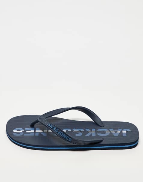 Jack & Jones logo flip flops in navy - view 1