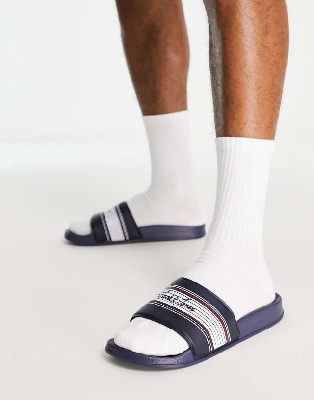 Jack & Jones logo slides in navy