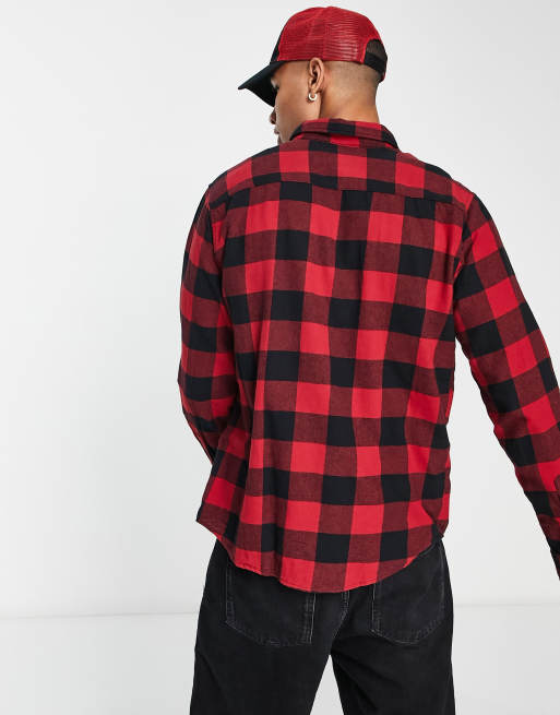 Red and black check shirt store with cap