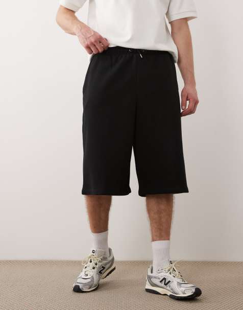 Jack & Jones longline sweat shorts in black - view 1