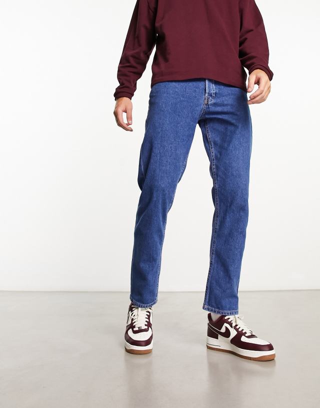 Jack & Jones loose fit jeans in mid blue