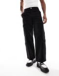 [Jack & Jones] Jack & Jones loose fit multi pocket cargo pants in black W31 L34 Black
