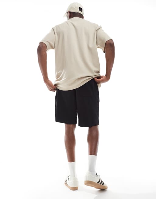 Jack & Jones loose fit sweatshirt fabric shorts in black    