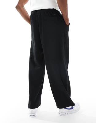 Jack & Jones loose fit textured trackies in black