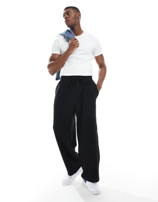 Jack & Jones loose fit textured trackies in black
