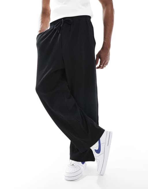Jack & Jones loose fit textured trackies in black