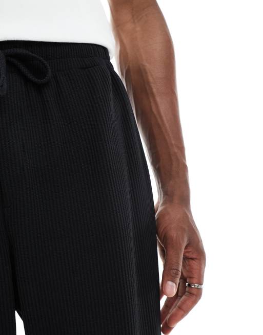Jack & Jones loose fit textured trackies in black