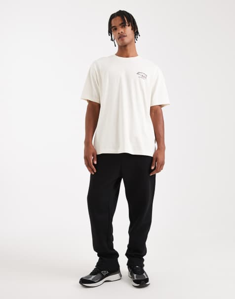 Jack & Jones loose fit trackies in black - view 1