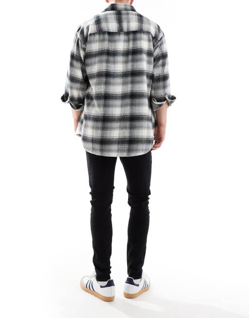 Jack & Jones – Mike – Schmal zulaufende Jeans in Schwarz, 2 von 5