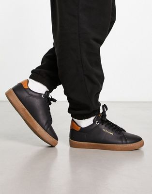 Jack & Jones minimal faux leather trainers in black with gum sole