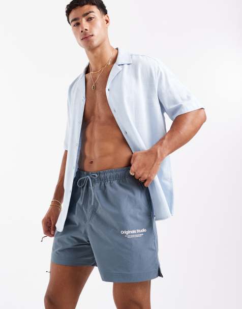 Jack & Jones swim shorts with originals logo in mid blue