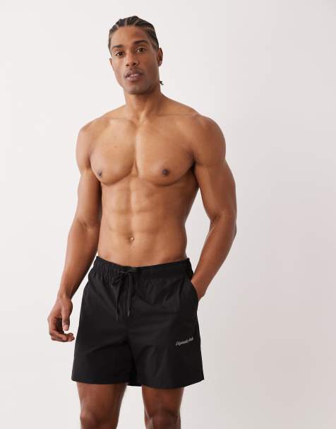 Jack & Jones originals logo swim shorts in black - view 1