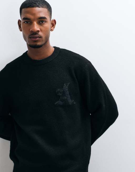 Jack & Jones oversized jacquard logo knit sweater in black | ASOS