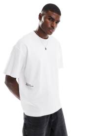 ASOS DESIGN relaxed tapered trousers in black