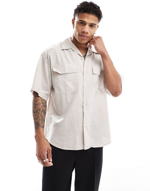 This t-shirt comes with a crew neckline oversized utility pocket linen shirt in beige