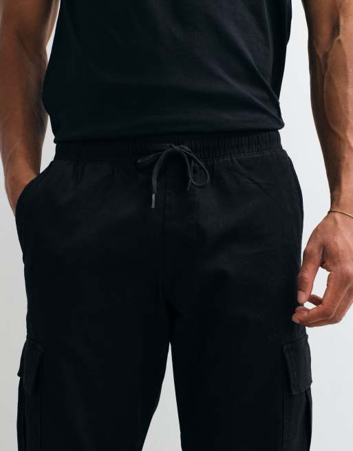 Jack & Jones - Pantalones cargo negros de corte slim con bajos ajustados, 3 de 5