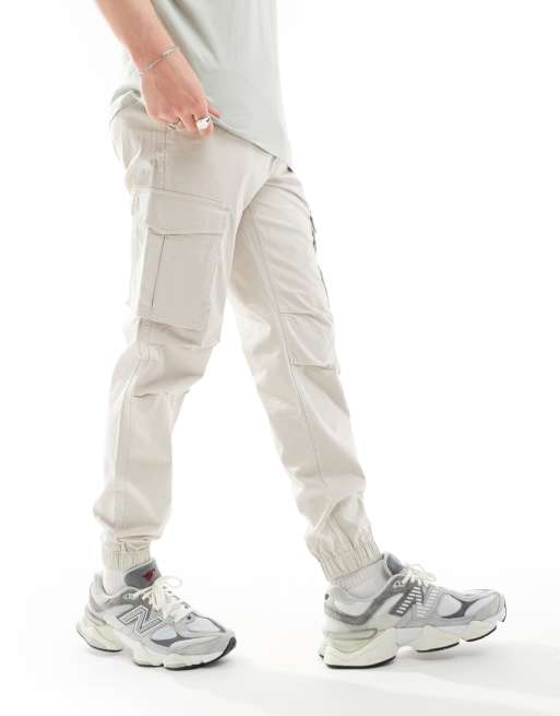 Jack & Jones - Pantaloni cargo beige con fondo elasticizzato vestibilità comoda 