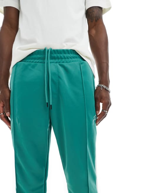 Jack & Jones – Premium – Trainingshose in Grün mit Streifen , 4 von 5