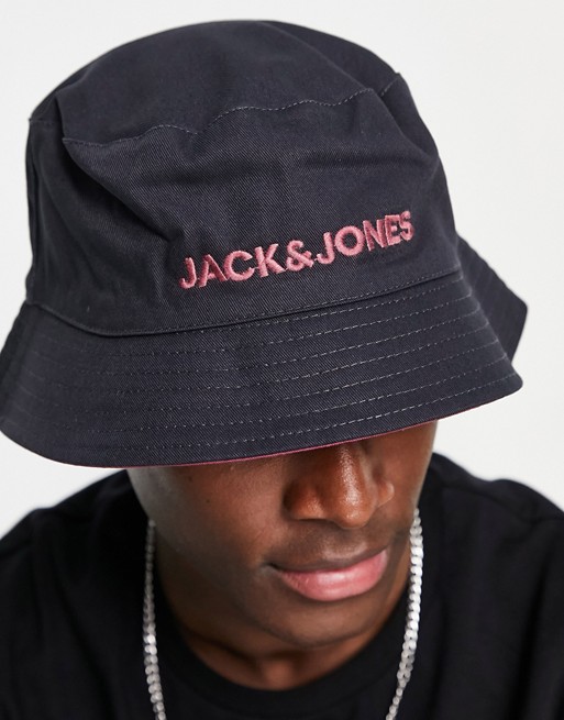 Jack & Jones reversible bucket hat with contrast logo in black and pink