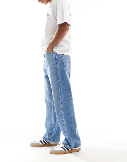 Jack & Jones Ron skater fit jeans in mid blue wash