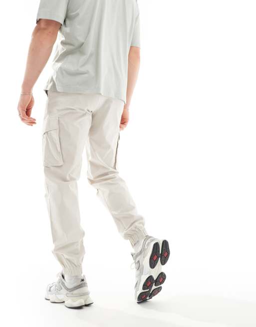 Jack & Jones - Ruimvallende cargobroek met aansluitende boorden in beige , 2 van 5