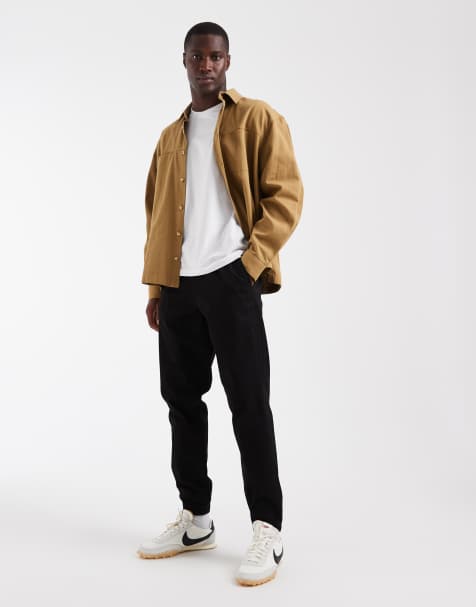 Jack & Jones – Schmal geschnittene Jogginghose in Schwarz mit Bündchen - view 1