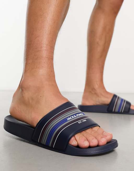 Jack & Jones - Sliders blu navy a righe con logo 
