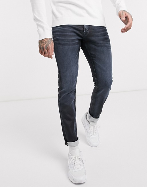 Jack & Jones Intelligence slim fit stretch coated jeans in blue