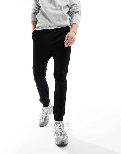 Jack & Jones slim fit trackies in black - view 1