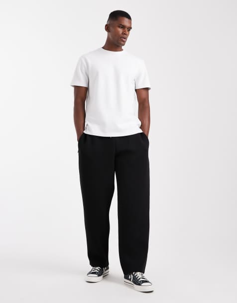 Jack & Jones - Sorte løstsiddende joggingbukser i scuba-lignende stof - view 1