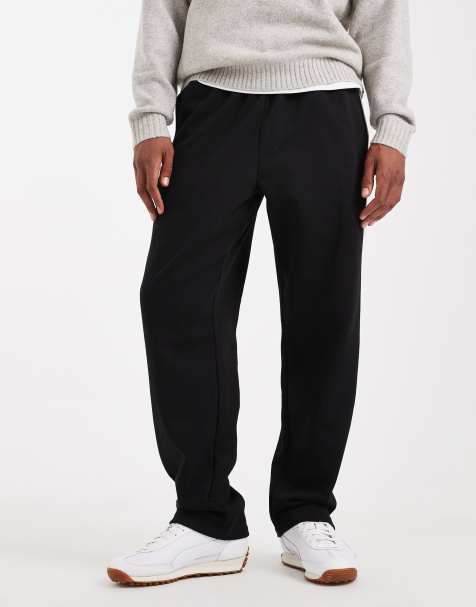 Jack & Jones - Sorte løstsiddende sweatpants med sidestriber - view 1