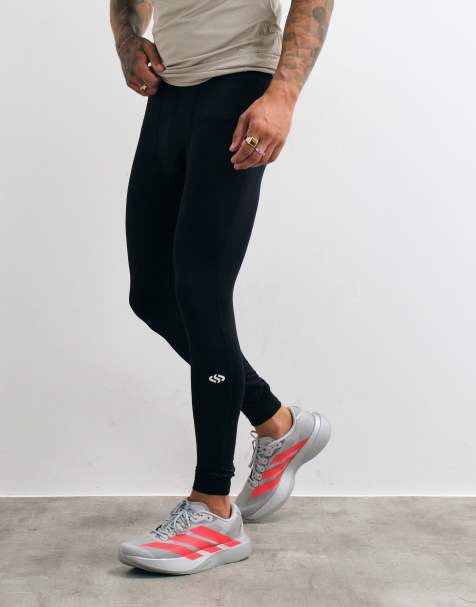 Jack & Jones Sports baselayer jersey leggings in black - view 1