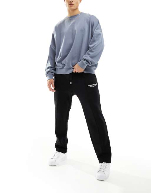 Jack Jones sweatpants with originals studio logo in black