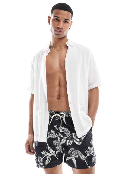 Jack & Jones swim shorts in black floral - view 1