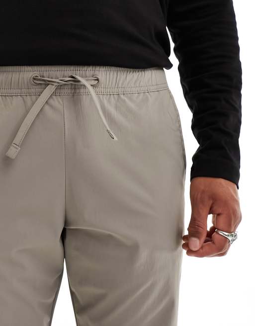 Jack & Jones - Tapered tech-bukser slidser i sømkanterne i brun, 2 af 5