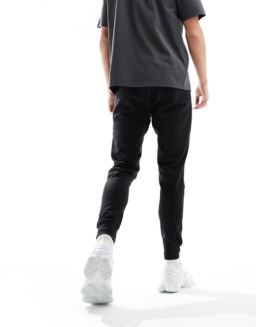 Jack & Jones tech trackies in black , 2 of 5