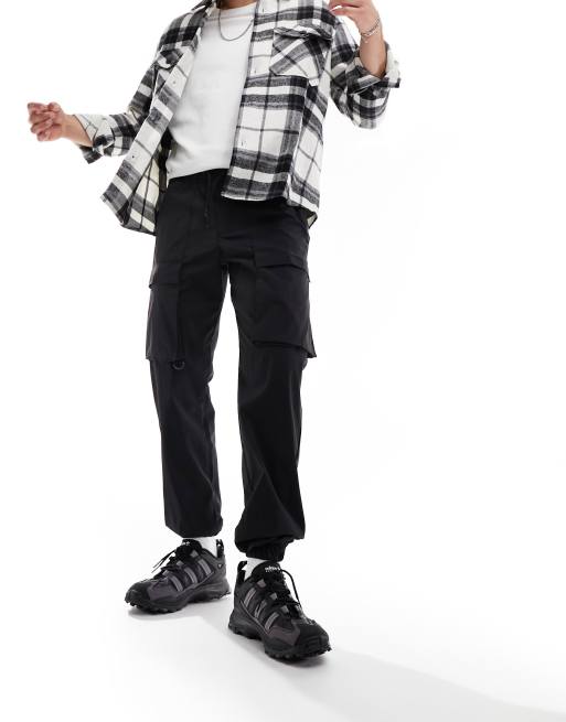 Jack & Jones technical cargos with front pocket in black
