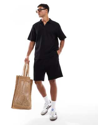 textured open neck polo shirt and shorts set in black