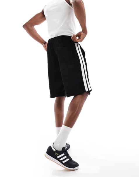 Jack & Jones towelling shorts with side stripe in black - view 1