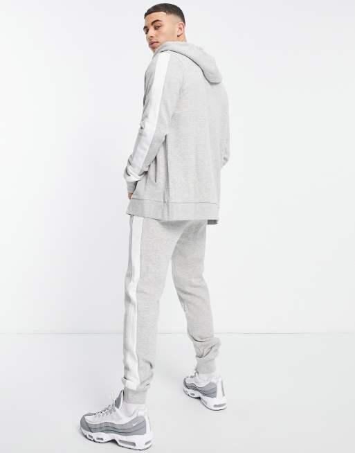 Grey nike tracksuit with white outlet stripe